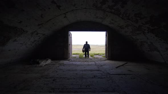 Desperate farmer near an empty barn.  World economic crisis