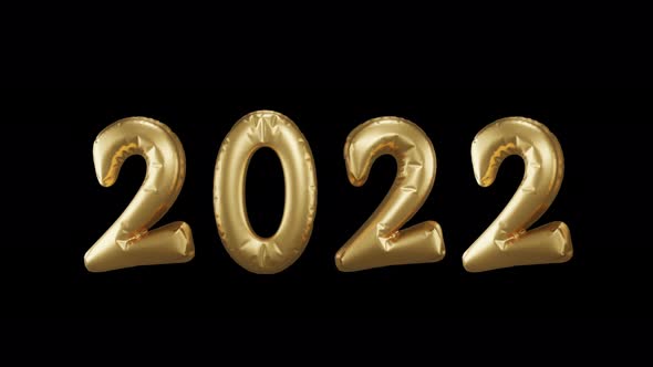 Golden foil balloons numbers 2022. New year concept