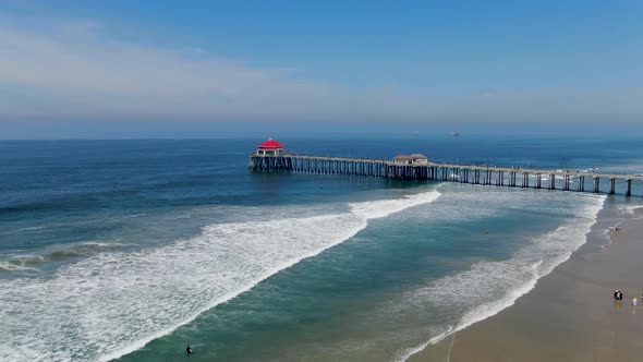 Aerial View of Huntington Pier, Beach and Coastline During Sunny Summer Day