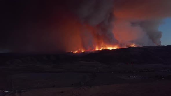 Nature Emergency. Aerial View on Bushes Fire in the Los Angeles Suburban, USA. 