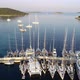 Aerial view of marina with moored white luxury yachts in mediterranean city - VideoHive Item for Sale