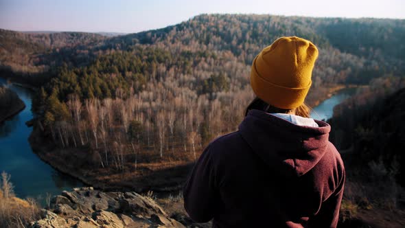 Woman Enjoys Hilly Landscape