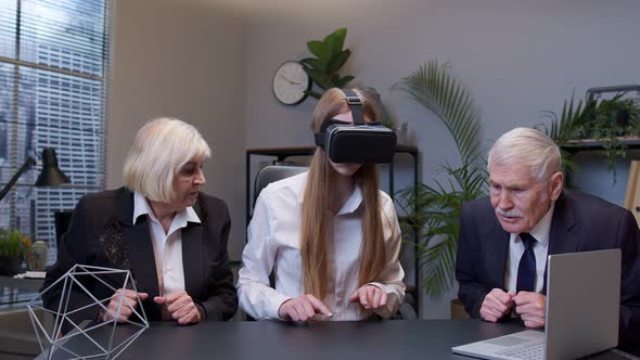 Businesswoman Using VR App Headset Helmet Doing Research Watching Virtual Reality Graph at Office