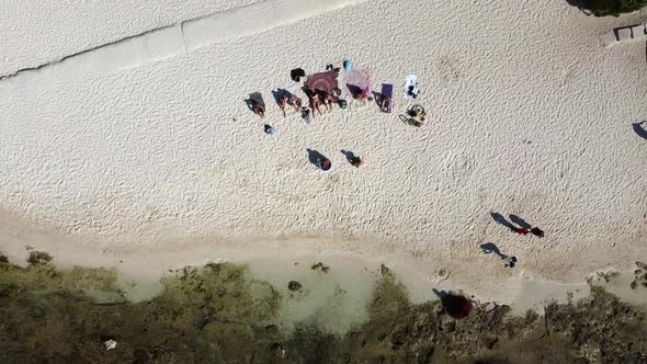 Aerial Shot of a Group doing Ice Bathing Activity at the Beach in Playa del Carmen Mexico