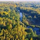 Aerial View of the River Among Forest in the Wild During Fall Season at Sunset - VideoHive Item for Sale