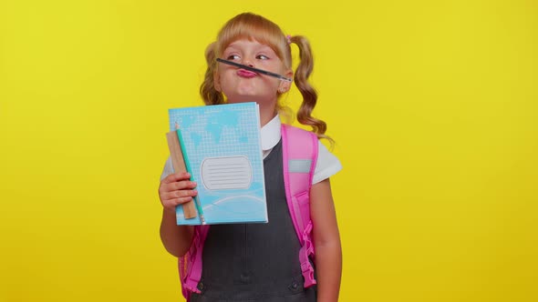 Funny Cute Kid Primary School Girl Making Playful Silly Facial Expressions Fooling Around with Pen