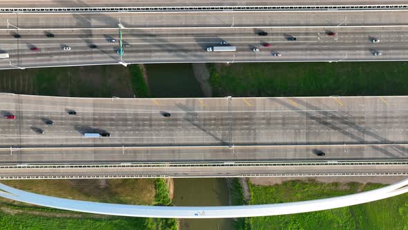 Traffic on Interstate 30 over Trinity River bridge in Dallas Texas. Aerial top down view.