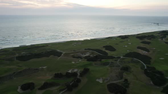 Beautiful PNW Sunset on Oregon Coast over Bandon Dunes Golf Course, Aerial