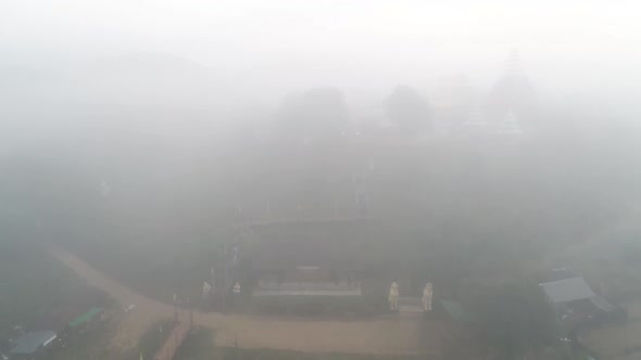 Aerial Footage Of Wat Su Tong Pae, Famous Temple In Mae Hong Son, Thailand in Foggy Weather