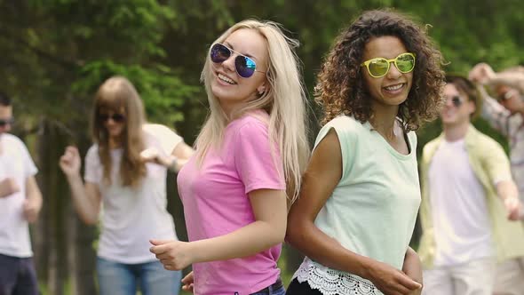 Best Friends Having Good Rest, Dancing and Smiling in Park, Cool Holidays