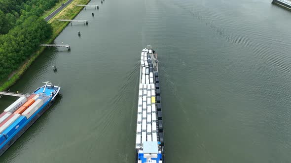 Vehicles Transported by Boat Entering the Volkerak Lock in the Netherlands