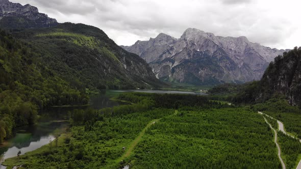 Beautiful Landscape with Mountains, forest and an Lake