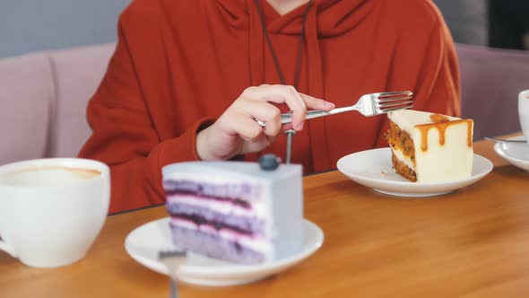 Girl Is Breaking Off a Piece of Carrot Cake