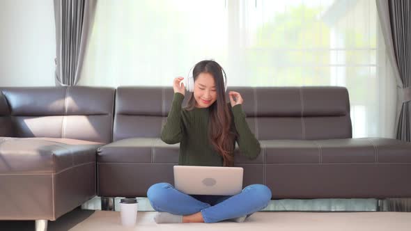 Woman use smart phone for listen music