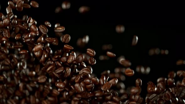 Coffee Beans and Flames After Being Exploded in Super Slow Motion