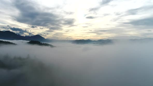 Aerial video of a fall landscape in Entlebuch, Switzerland at sunset. 