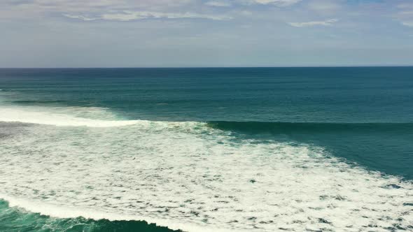 Blue Ocean with Waves and Sky with Clouds Seascape Top View