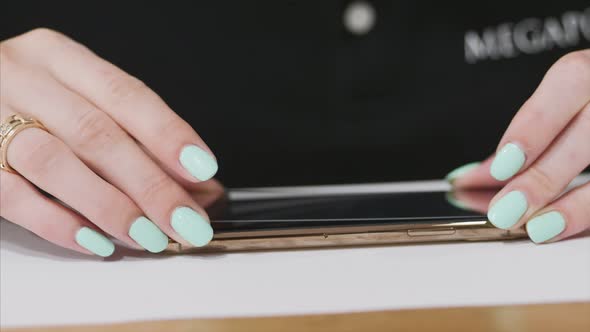 Installation of a Protective Screen on Mobile Phone Closeup