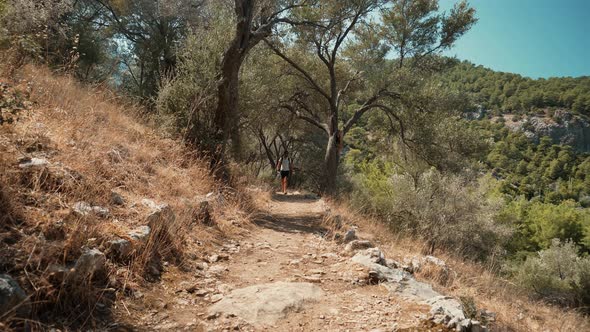 Man Walk Shoot Mobile Photo In Ancient Town Turkey Kemer Archeology. Tourist Photo Smartphone.