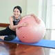 Asian woman squat with yoga ball for muscle workout weight training and yoga exercise at home - VideoHive Item for Sale