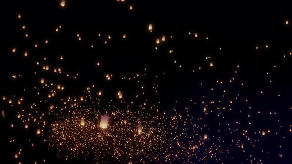 Sky Lanterns Fly Into The Night Sky