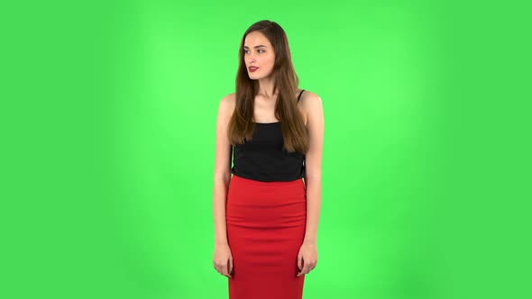 Cute Female Looking with Excitement, Then Celebrating Her Victory Triumph. Green Screen