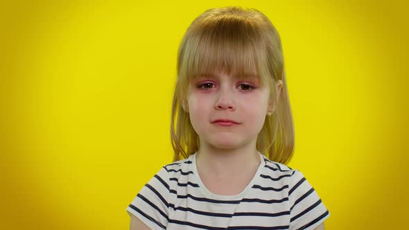 Disappointed Upset Kid Child Girl with Tears on Eyes Cries From Despair Sad Because of Unfair Things