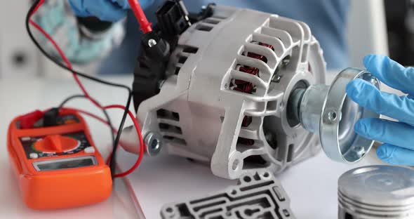 Master Repairing Generator for Car Using Tester Closeup  Movie