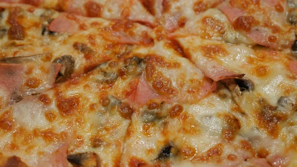 Pizza taken from oven slow tilting  4K 3840X2160 UHD footage - Shallow DOF pizza details slow  tilti