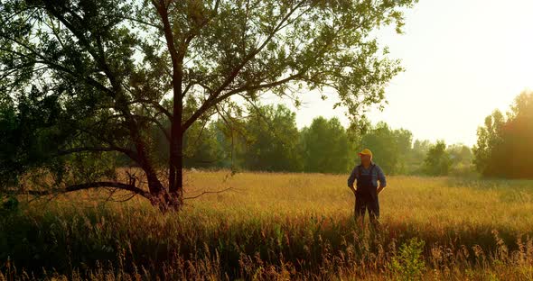 Portrait of a Male Farmer in a Wheat Field