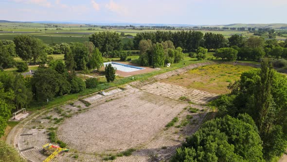 Aerial view of a swimming pool in the town of Tornala in Slovakia