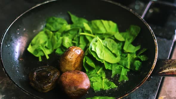 Delicious Tasty Mushrooms Cooked with Leafy Greens 