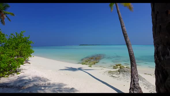 Aerial drone view scenery of idyllic sea view beach lifestyle by shallow ocean and clean sand backgr