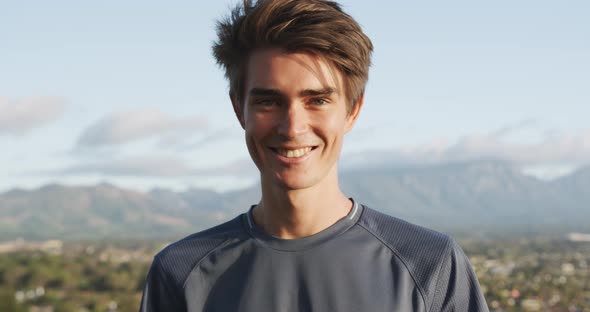 Portrait of young man in countryside