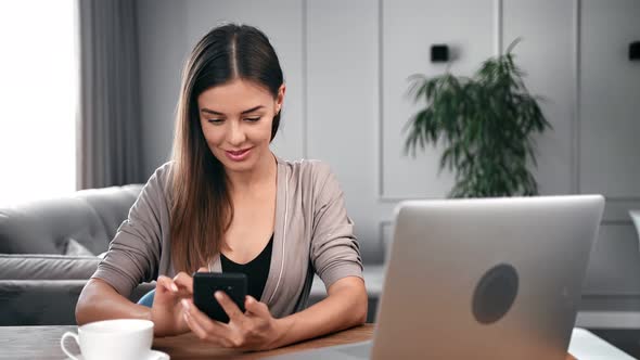 Happy Female Chatting or Surfing Internet Use Smartphone