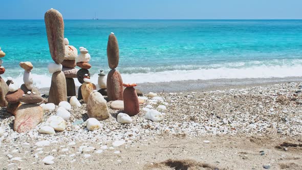 Concept of Balance and Harmony. - Stone Stacks on the Beach