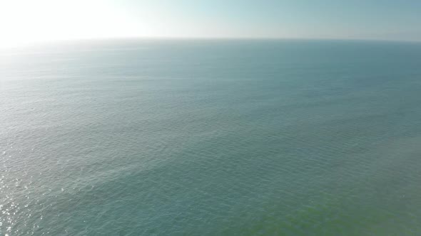 Static Aerial of Expansive Ocean to the Horizon