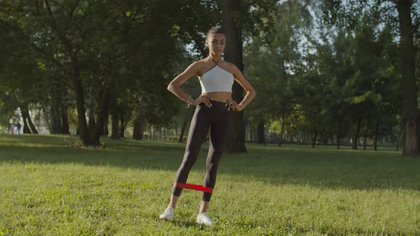 Fitness Woman Working Out with Resistance Band