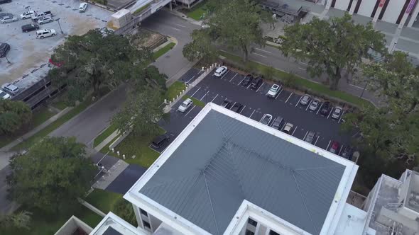 Reveal shot as aerial view passes over Florida Supreme Court building, eagle eye.