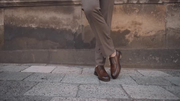 Feet of Businessman Commuting to Work