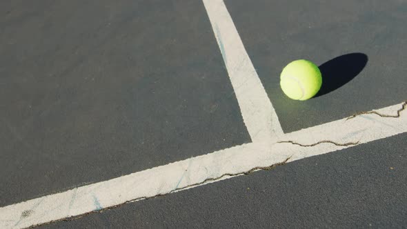Video of tennis ball lying on tennis court