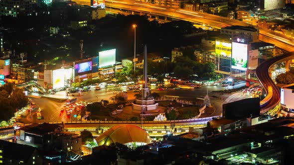 time lapse of Victory monument in central transportation at night in Bangkok, Thailand