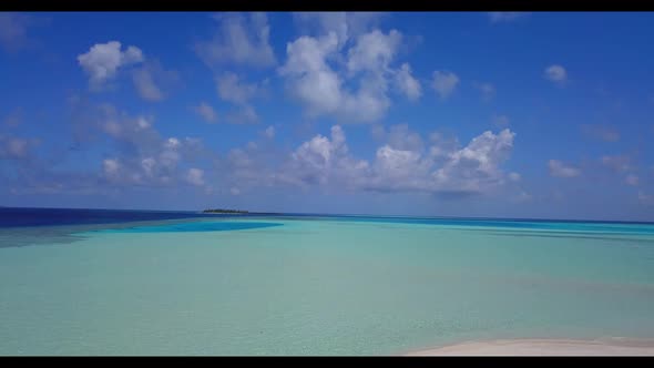 Aerial drone landscape of luxury bay beach trip by blue green ocean with white sand background of ad