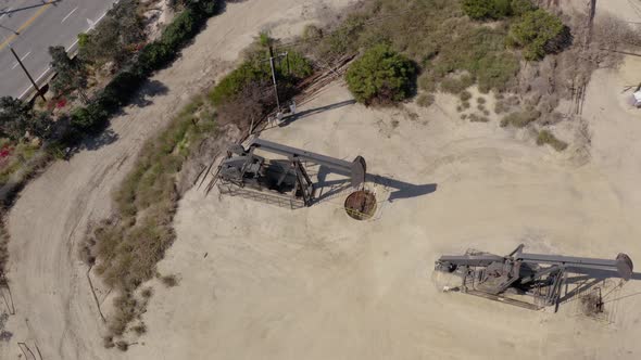 Oil pump jack on the factory. Aerial view oil refinery factory.