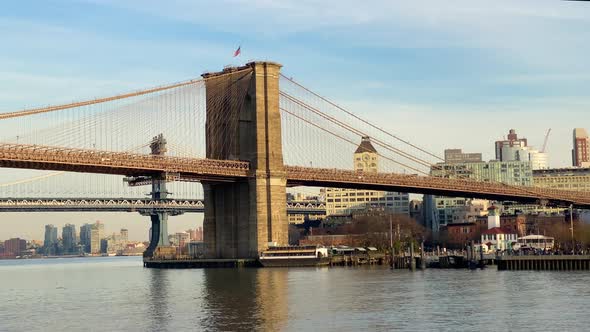 Sailing Under the Two Bridges on East River Brooklyn Bridge and Manhattan Bridge