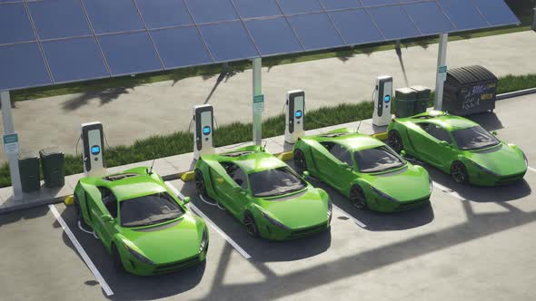 Electric cars connected to the charging station. Vehicles using renewable energy