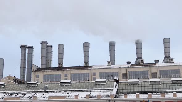 Smoke Billows From the Pipes of a Hydroelectric Power Station or Boiler House