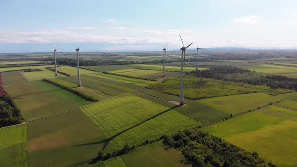 Aerial View of Wind Turbines Farm and Agricultural Fields. Austria.