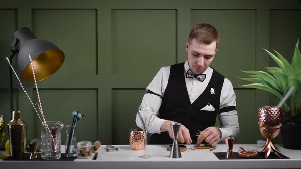 The Bartender Prepares His Desk for the Arrival of Guests. The Bar Should Have Everything You Need