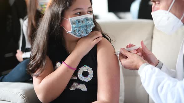 Young Girl Getting Vaccinated in Covid19 Coronavirus Pandemic